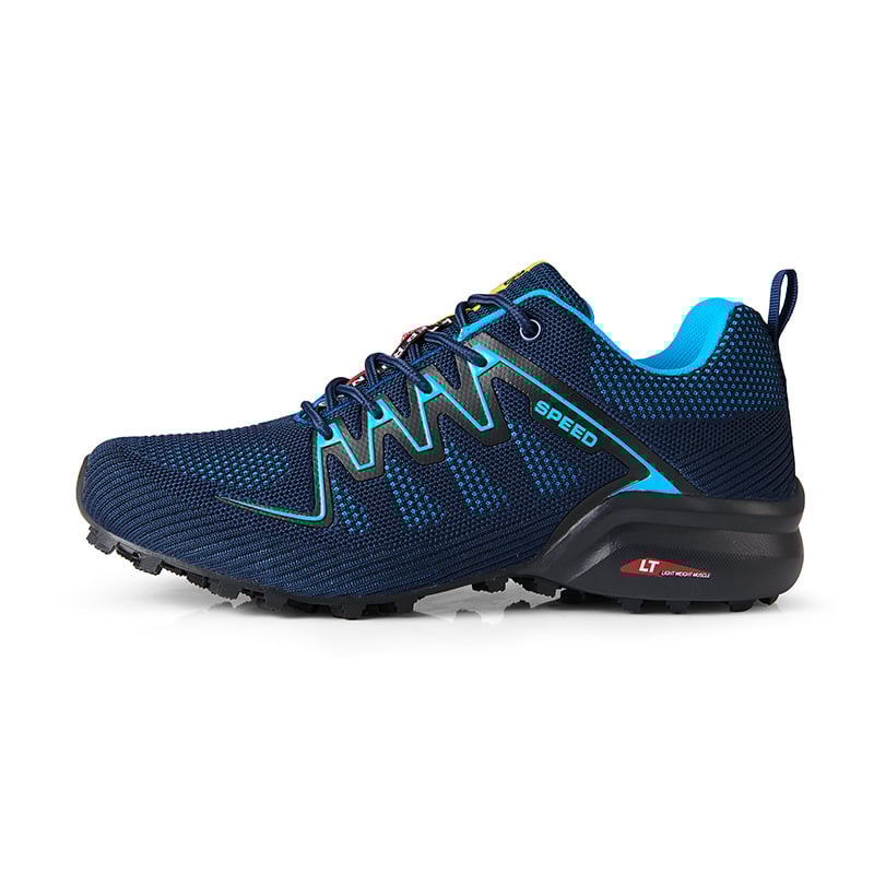 Dunkelblauer Trailrunning-Schuh mit grün-blauen Akzenten, robustem Profil und atmungsaktivem Material. Ideal für Outdoor-Sport und Laufen.