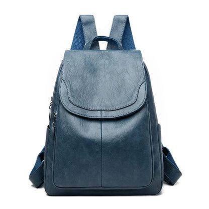 Dunkelblauer Damenrucksack aus Leder mit Reißverschluss, modisches Design, ideal für Reisen und Alltag, stilvoll und praktisch.
