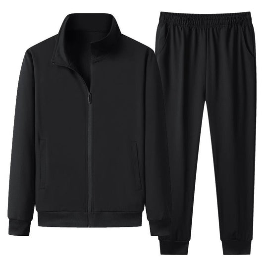 Schwarzer Trainingsanzug für Herren, bestehend aus Jacke mit Reißverschluss und Jogginghose. Sportbekleidung, bequem, modern, vielseitig einsetzbar.