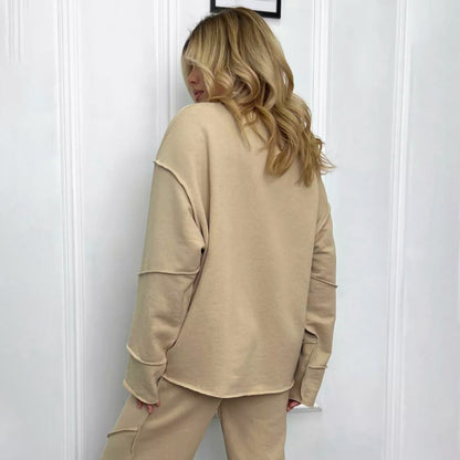 Damen-Strickset für den Herbst mit langärmligem Pullover und Hose mit geradem Bein und Einsatzdetails