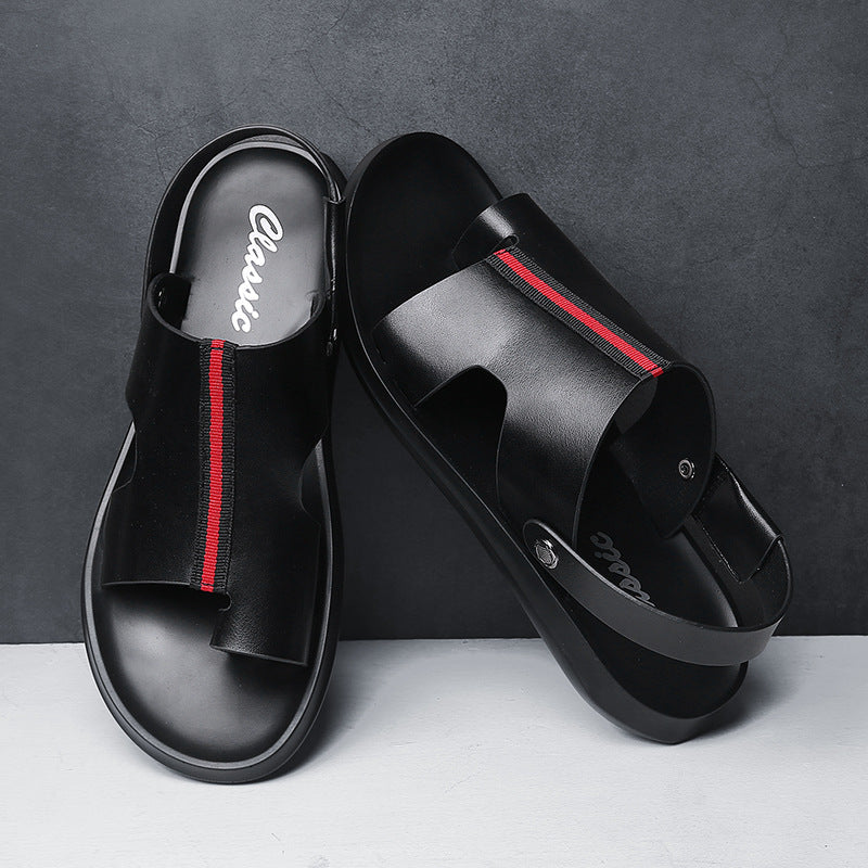 Schwarze Ledersandalen mit rotem Streifen, modisches Design, rutschfeste Sohle, ideal für Sommermode und Freizeitkleidung.