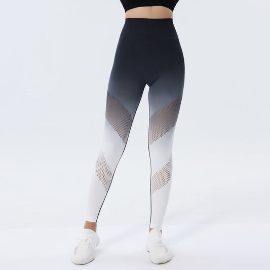 Damen-Sportleggings in Schwarz-Weiß mit Mesh-Design, hoher Taille und nahtlosem Schnitt, ideal für Fitness und Yoga.