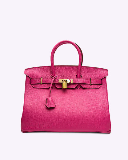 Luxuriöse pinke Designer-Handtasche aus Leder mit goldener Schnalle, elegantes Accessoire für Damen, modisches Statement, hochwertige Verarbeitung.