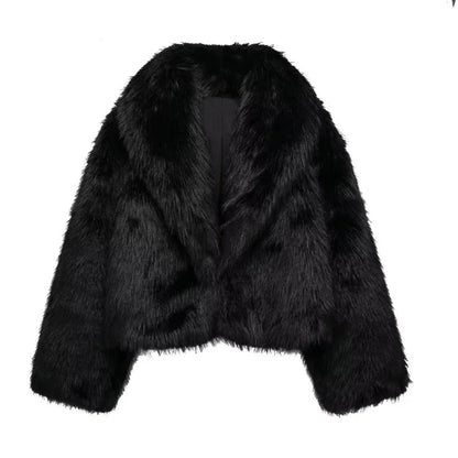 Schwarze Kunstpelzjacke, flauschig und stilvoll, ideal für Wintermode. Elegante Damenbekleidung, warm und luxuriös. Perfekt für kalte Tage.
