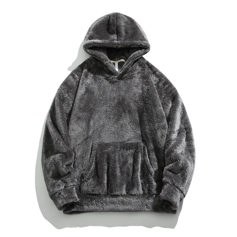 Grauer flauschiger Hoodie aus Kunstpelz, warm und gemütlich, ideal für Herbst und Winter. Perfekt für modische Freizeitkleidung und Streetwear.