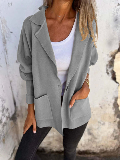 Langer Damenmantel mit Reverskragen und Taschen - Ideal für Herbst und Frühling