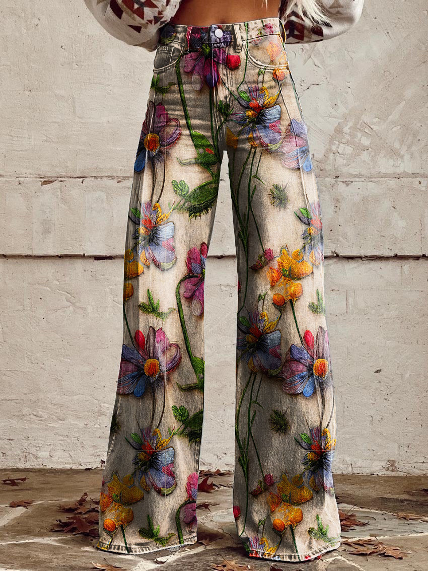 Bunte Damen-Jeans mit floralen Stickereien, weites Bein, modisch, trendige Blumenmuster, ideal für Frühling und Sommer, lässiger Boho-Stil.