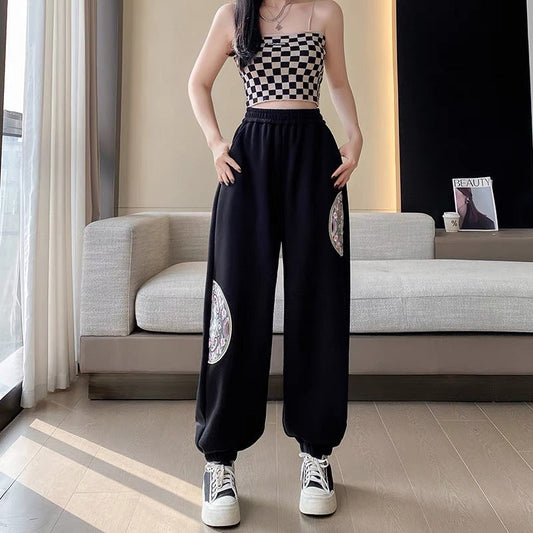 Damen-Sommer-Sporthose mit verkürztem Schnitt elastischem Bund und weitem Bein