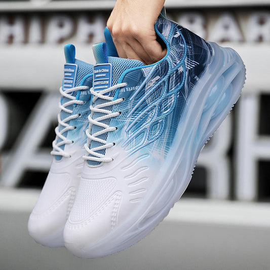 Weiße und blaue Sportschuhe mit modernem Design, atmungsaktivem Mesh-Obermaterial und dicker Sohle. Ideal für Laufen und Freizeit.